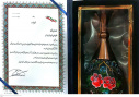 تجلیل از دانشجوی دانشگاه جامع علمی کاربردی استان قزوین به عنوان اشتغالآفرین نمونه رشته پرورش زنبور عسل